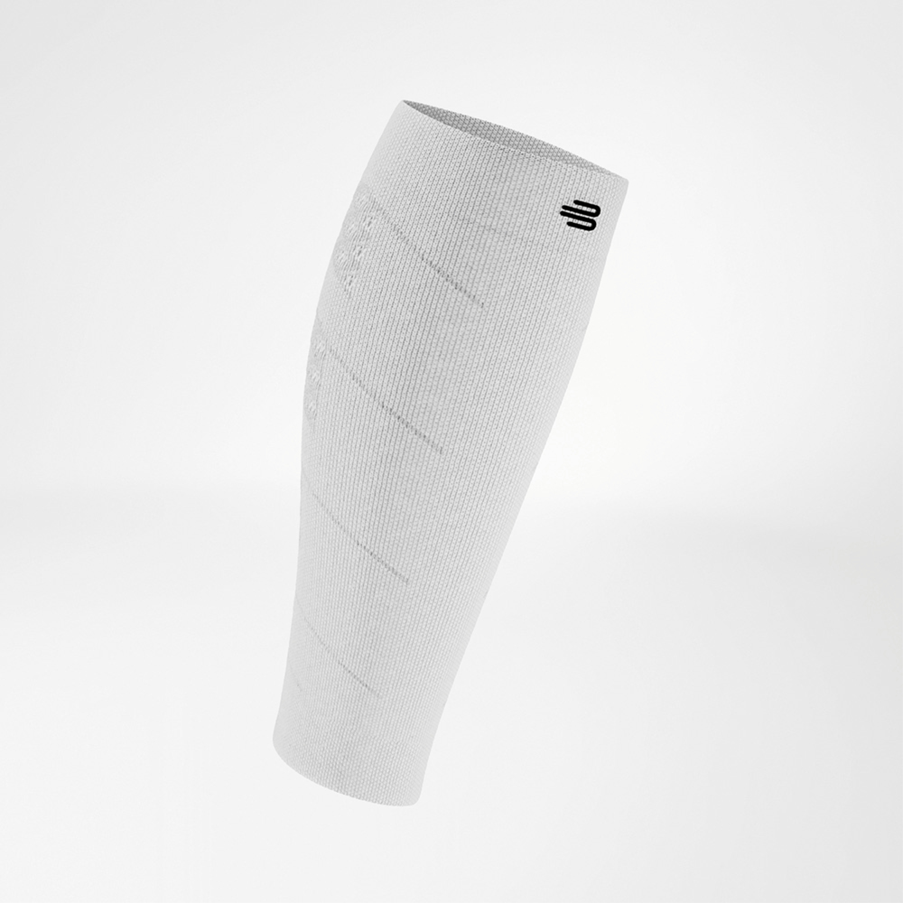 White compression sleeve in front view, minimal design with fine texture, black logo at the top.