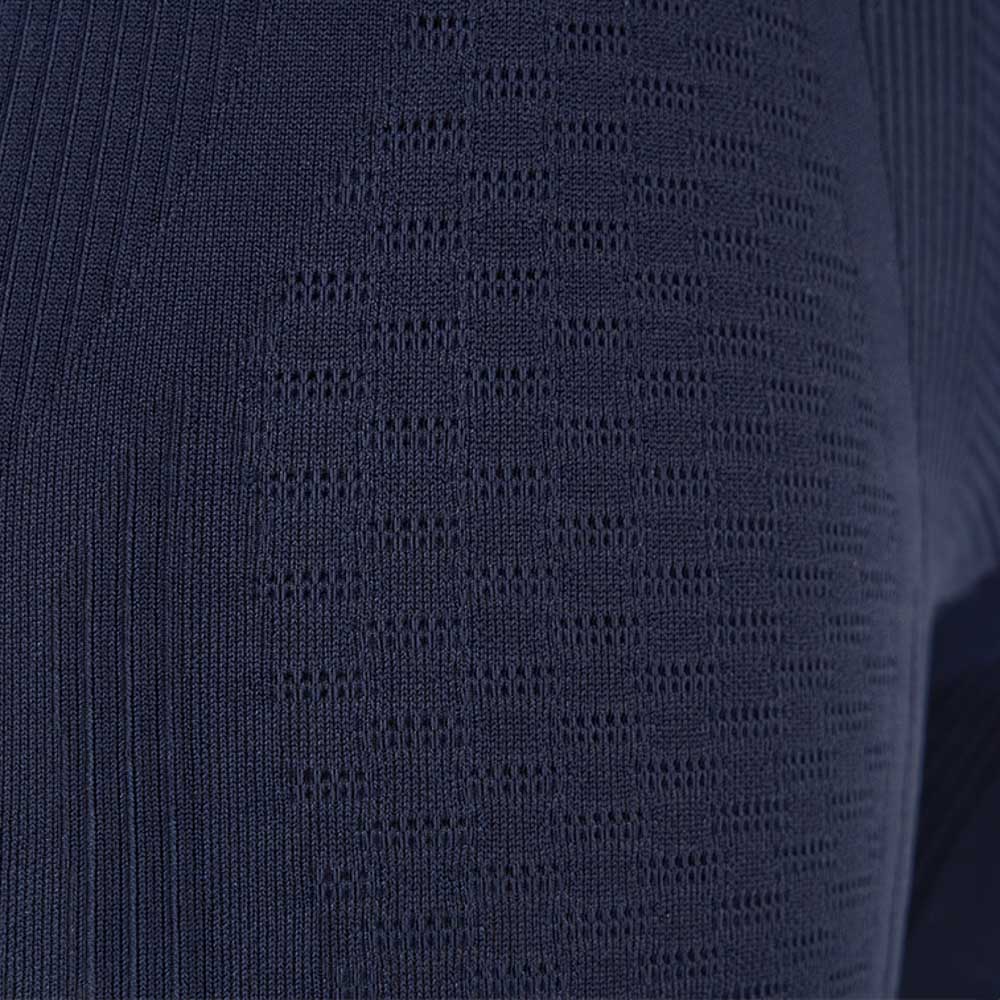 Close-up of a dark compression sports wear tight with detailed fabric pattern, providing high comfort and optimal muscle support.