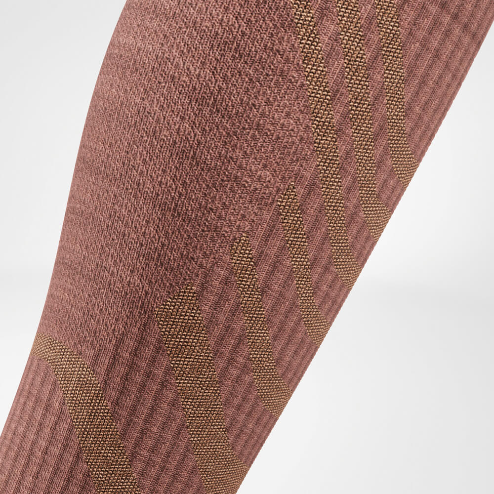 Close-up of the calf area of the Merino Outdoor Socks. The fine knit structure provides support and flexibility for long outdoor adventures.