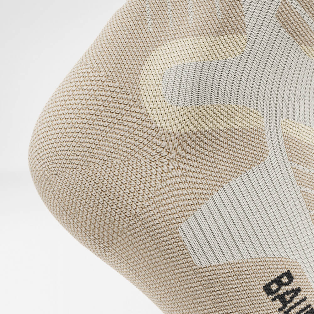 Ski sock downhill with merino wool beige detail Heel Protection Detailed view of the Heel Protection Zone of the beige sports socks for skiing with merino wool