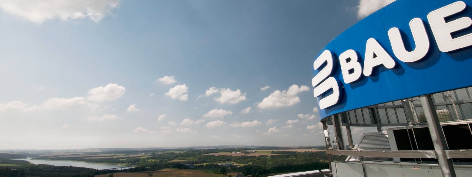 Bauerfeind lettering at the company headquarters in Zeulenroda in the background the landscape