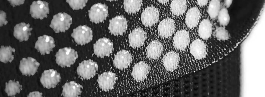 Zoom on a black NBA KNEE SLEEVES with the upper part and view of the silicone healing nops