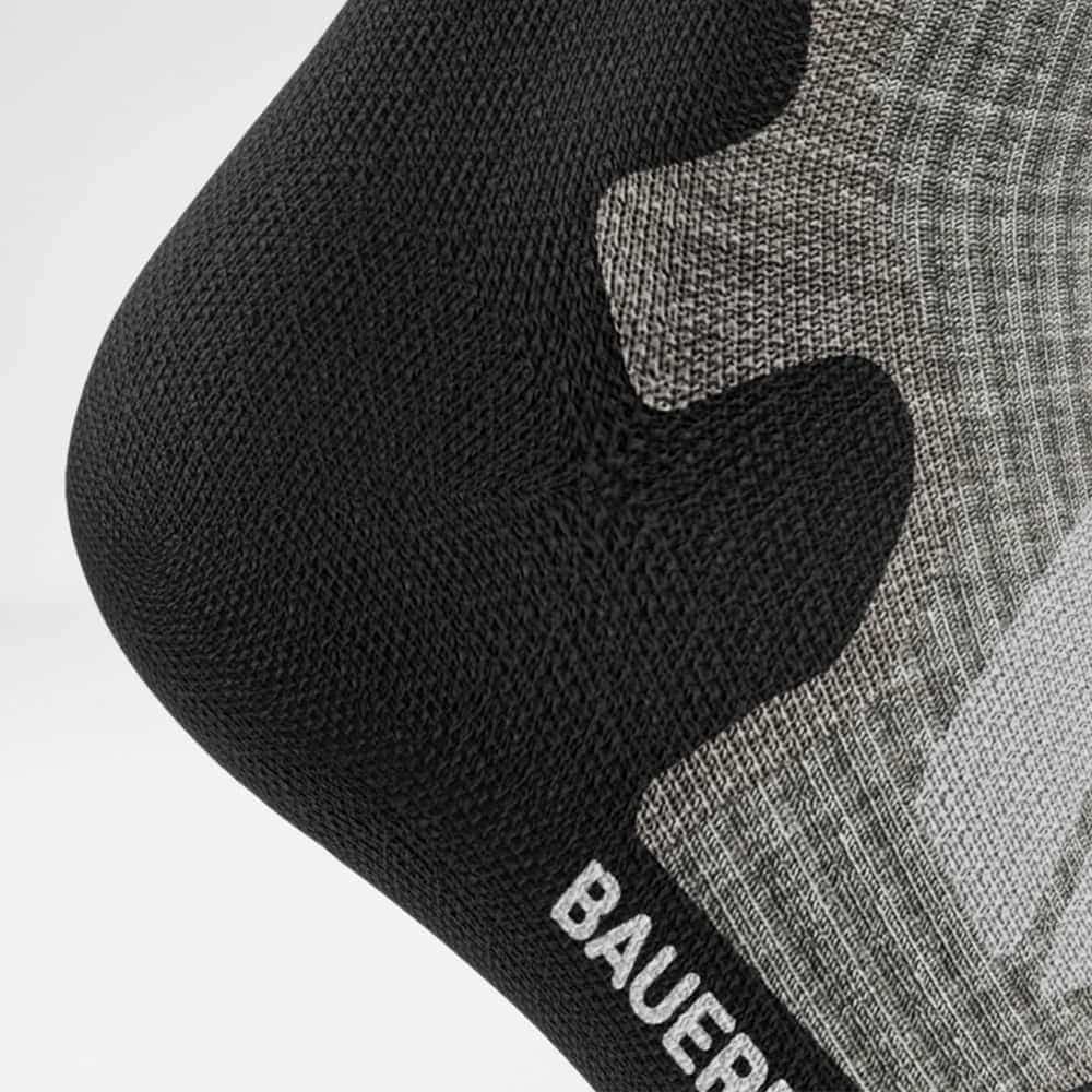 Detailed view of the heel of the merino hiking socks in light gray