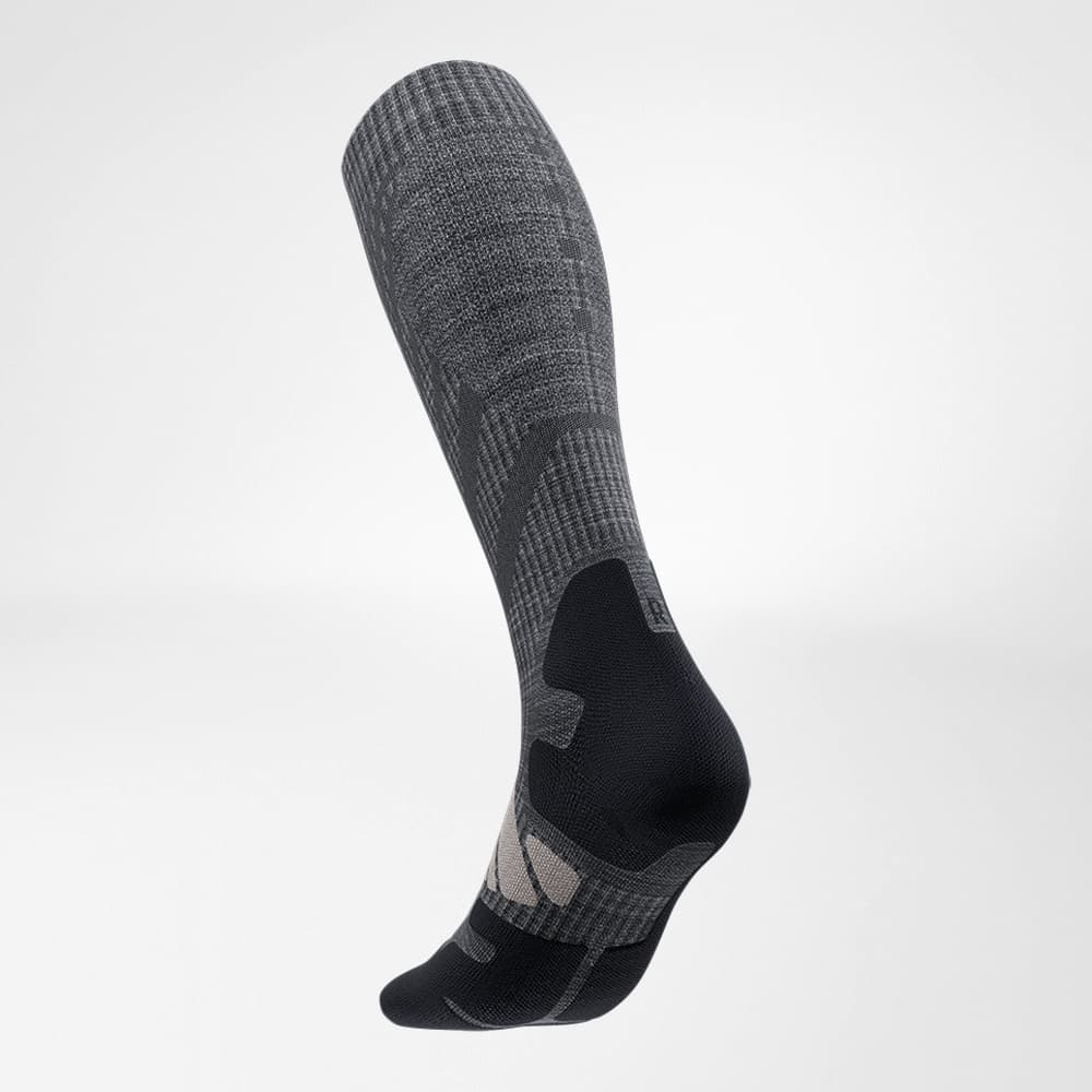 Lateral back view of the merino hiking socks in dark gray