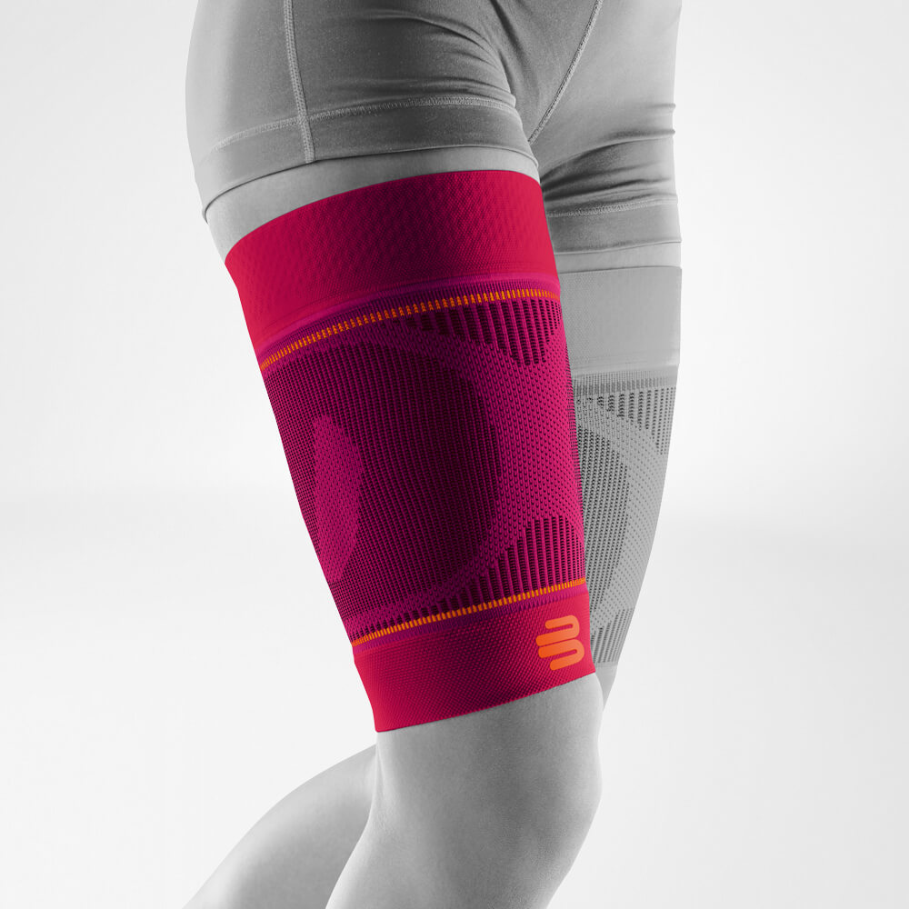 Thigh Sleeves Pink front slanted Complete view of the pink thighs Sport Sleeves on the stylized gray leg