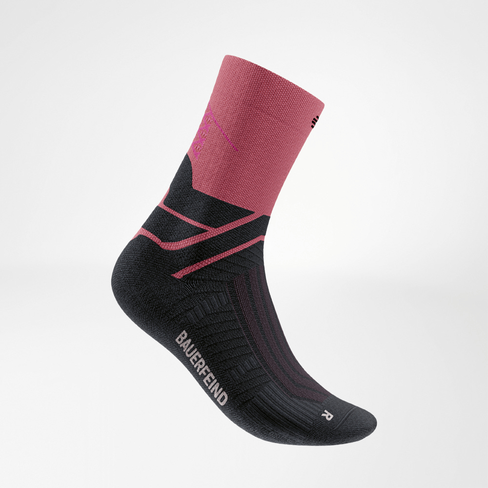 Black running sock with a red shaft and red reinforcements. The Bauerfeind logo is visible on the side, the Infinity Zone supports the ankle area.