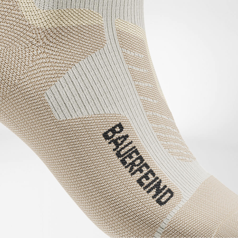 Ski sock downhill with merino wool beige detail Ski Boot Comfort Detailed view on Ski Boot Comfort Zone of the beige sports socks for alpine skiing with merino wool