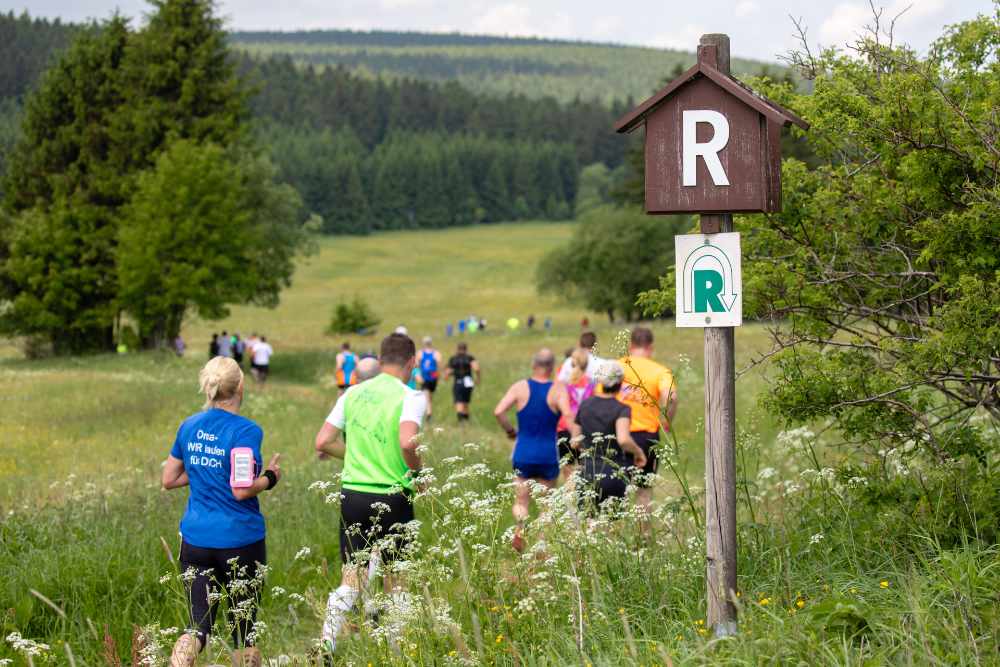 Runners of the racing runway run through nature