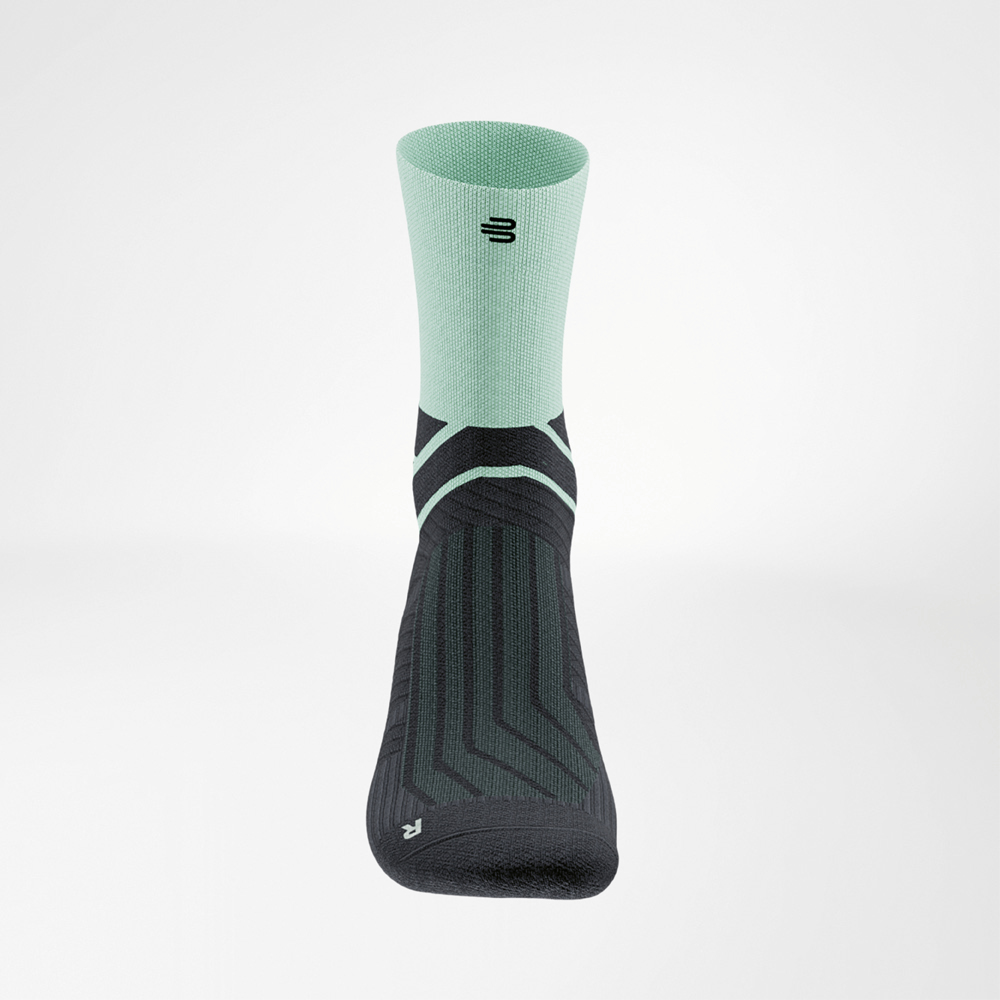 Front view of a green and black Run Performance Midcut Sock with a bold contrast design and sporty character.