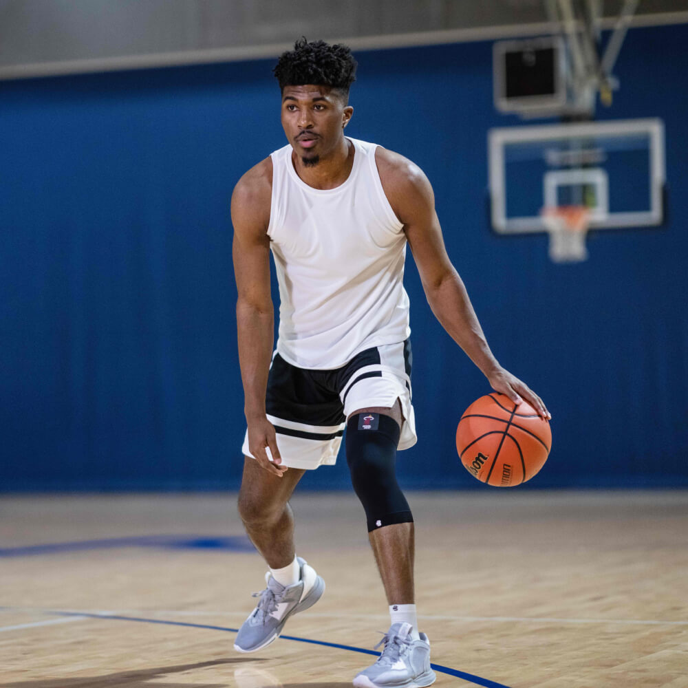 Knee Sleeve NBA at basketball dribbling