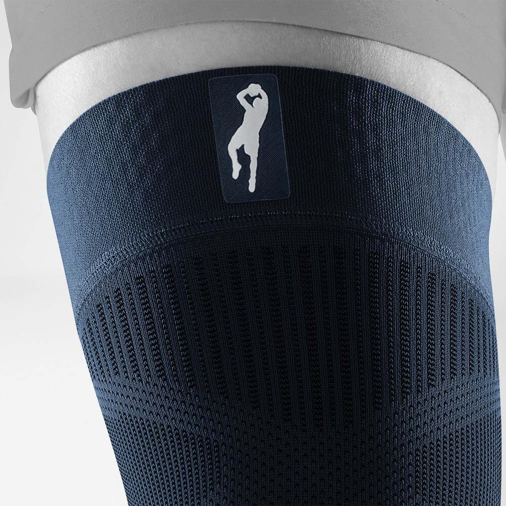 Knee Sleeve Dirk Nowitzki Detail Logo Detailed view on the upper part of Dirk Nowitziki Knee Sleeves with a focus logo