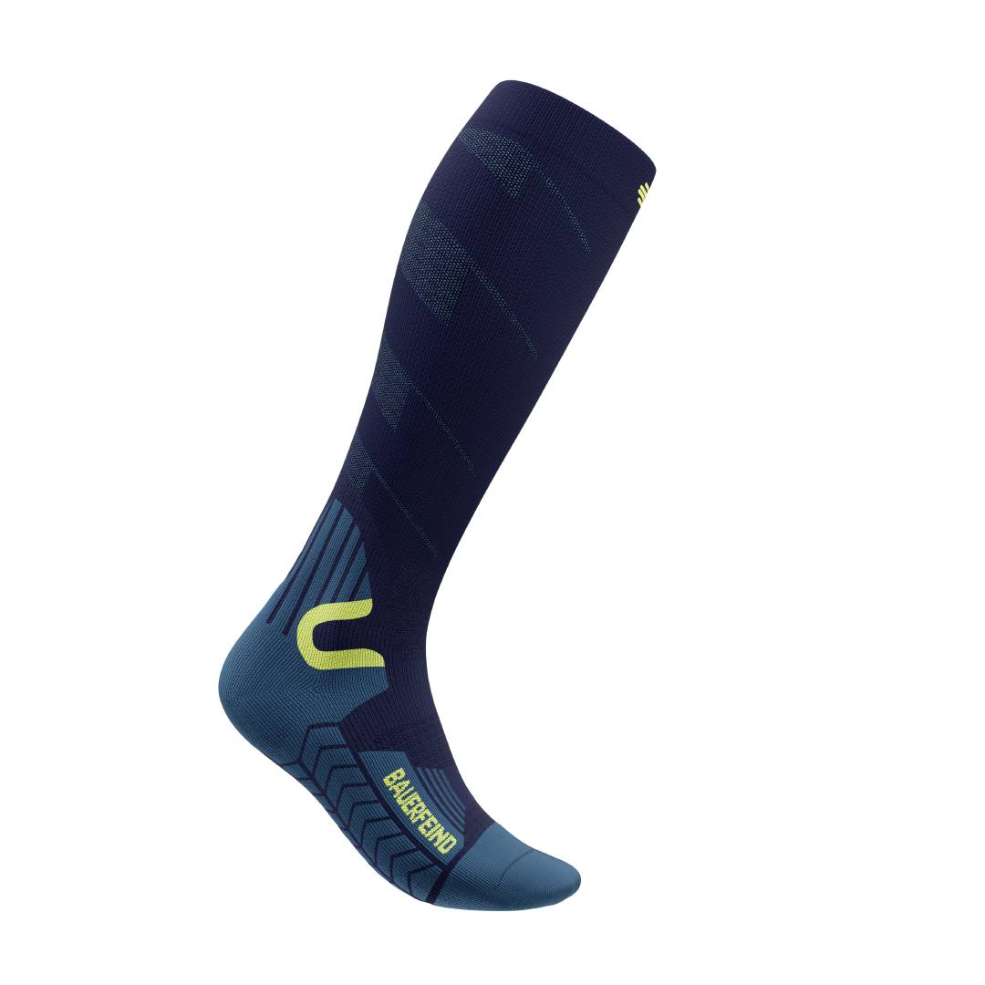 Blue ski socks against a white background