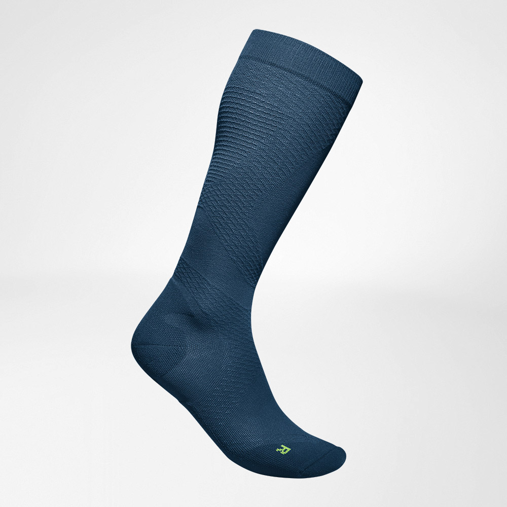 Compression socks sport ultra -light blue side view Lateral complete view of the blue airy, knitted compression socks to run