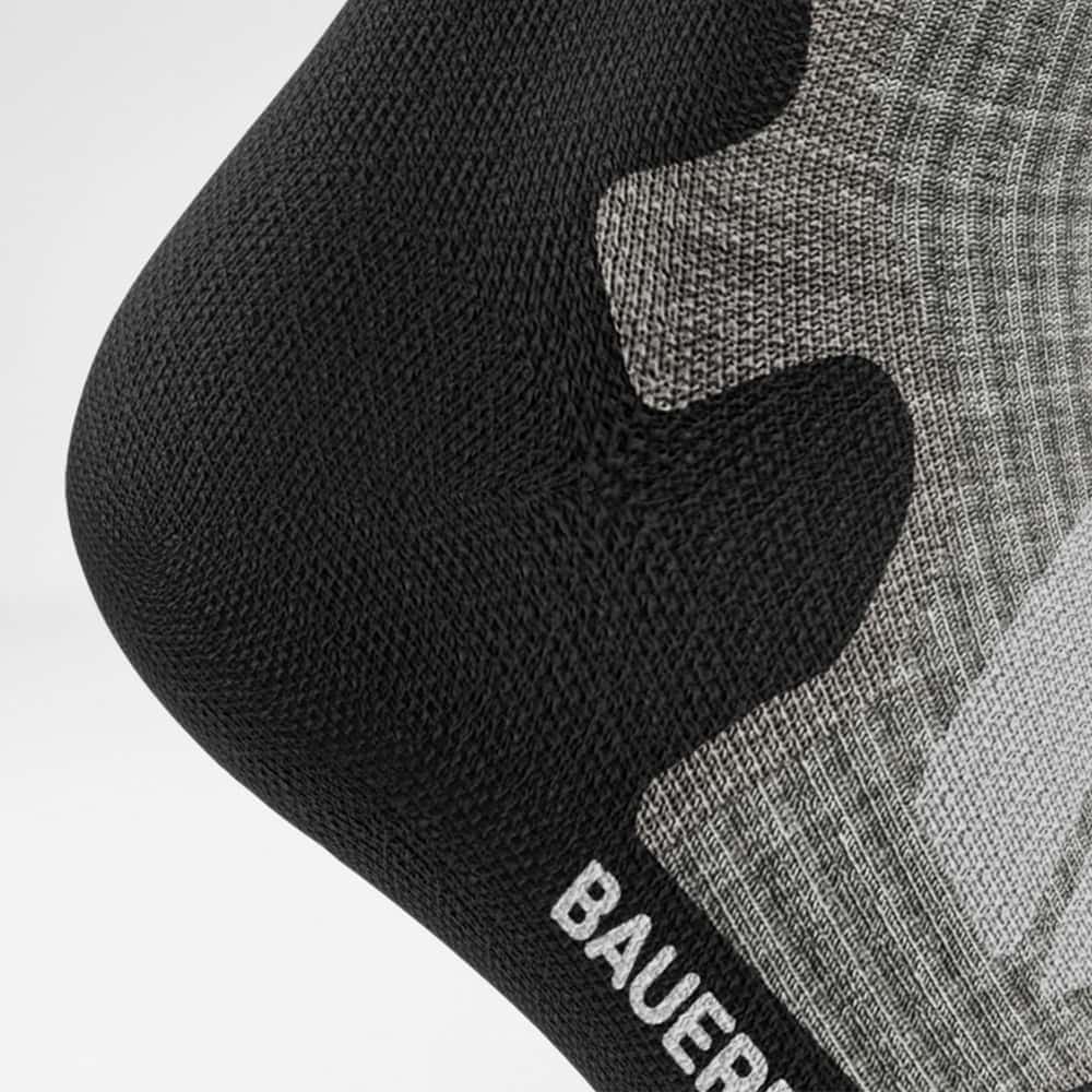 Detailed recording of the heel protection zone of the light gray medium -length Merino - hiking socks