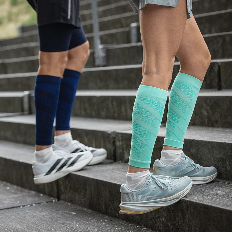 Close up of colorful running socks on the body in an urban environment