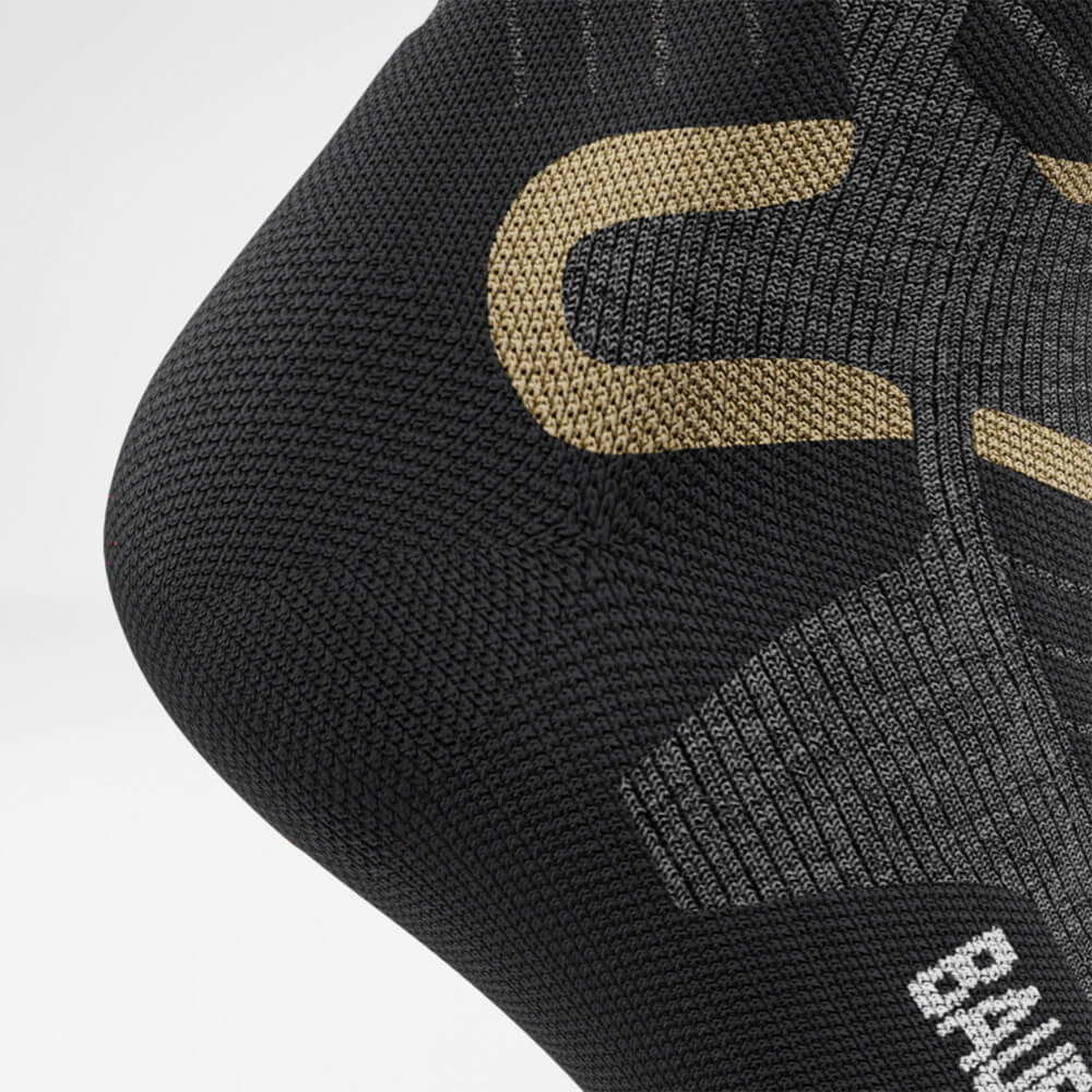 Detail on Heel Protection Zone of the grey sports sock for alpine skiing with merino wool