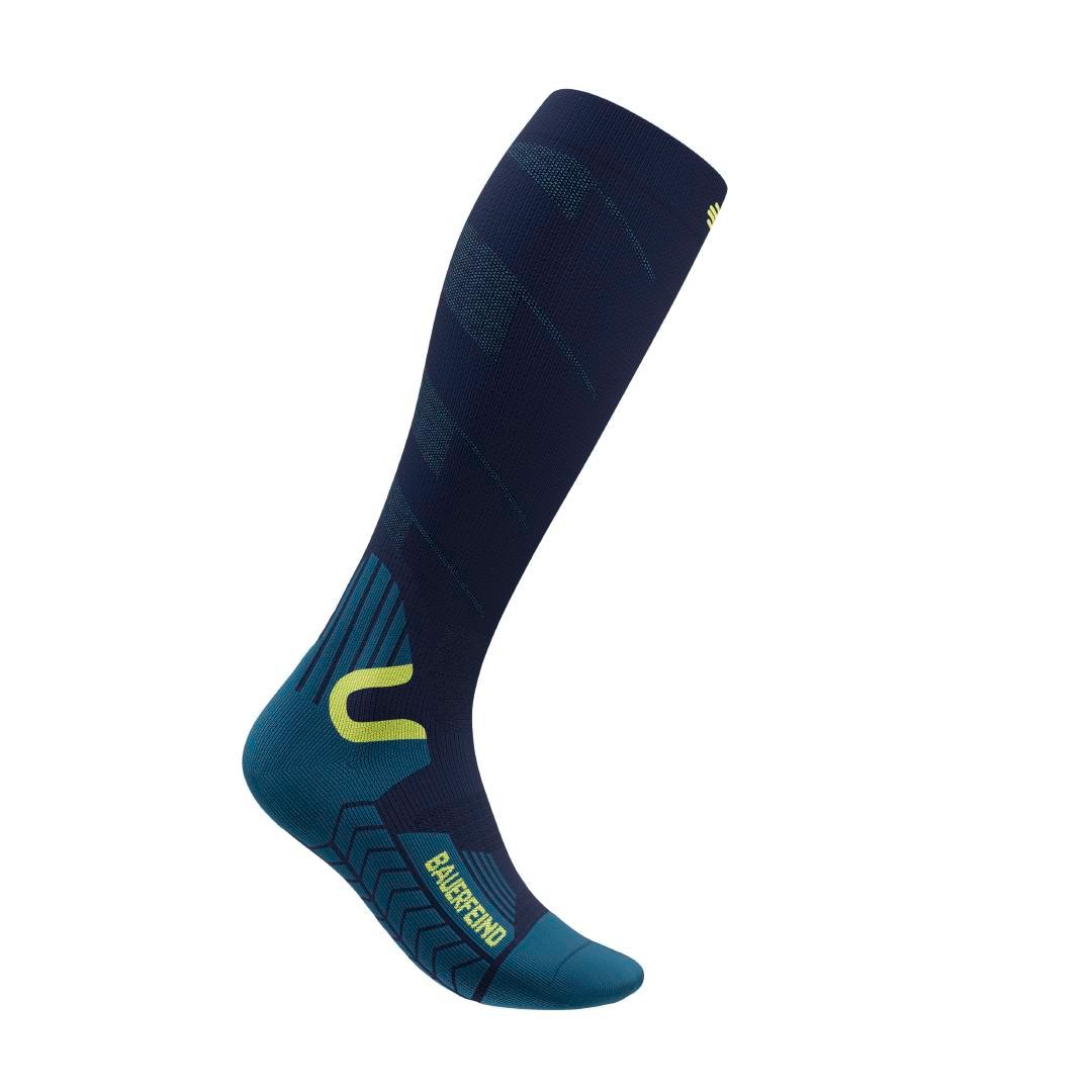Blue ski socks against a white background