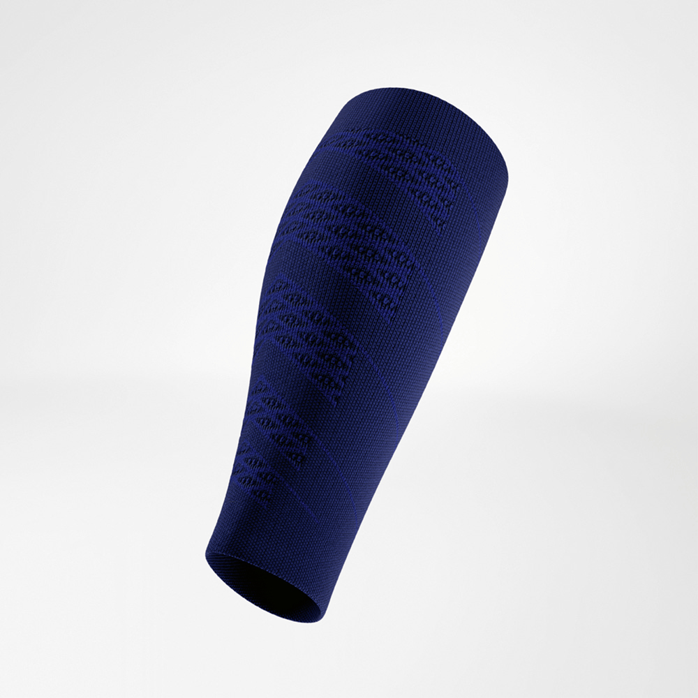 Side view of a blue calf compression sleeve. The elastic material shows fine textures with the logo clearly visible at the top.