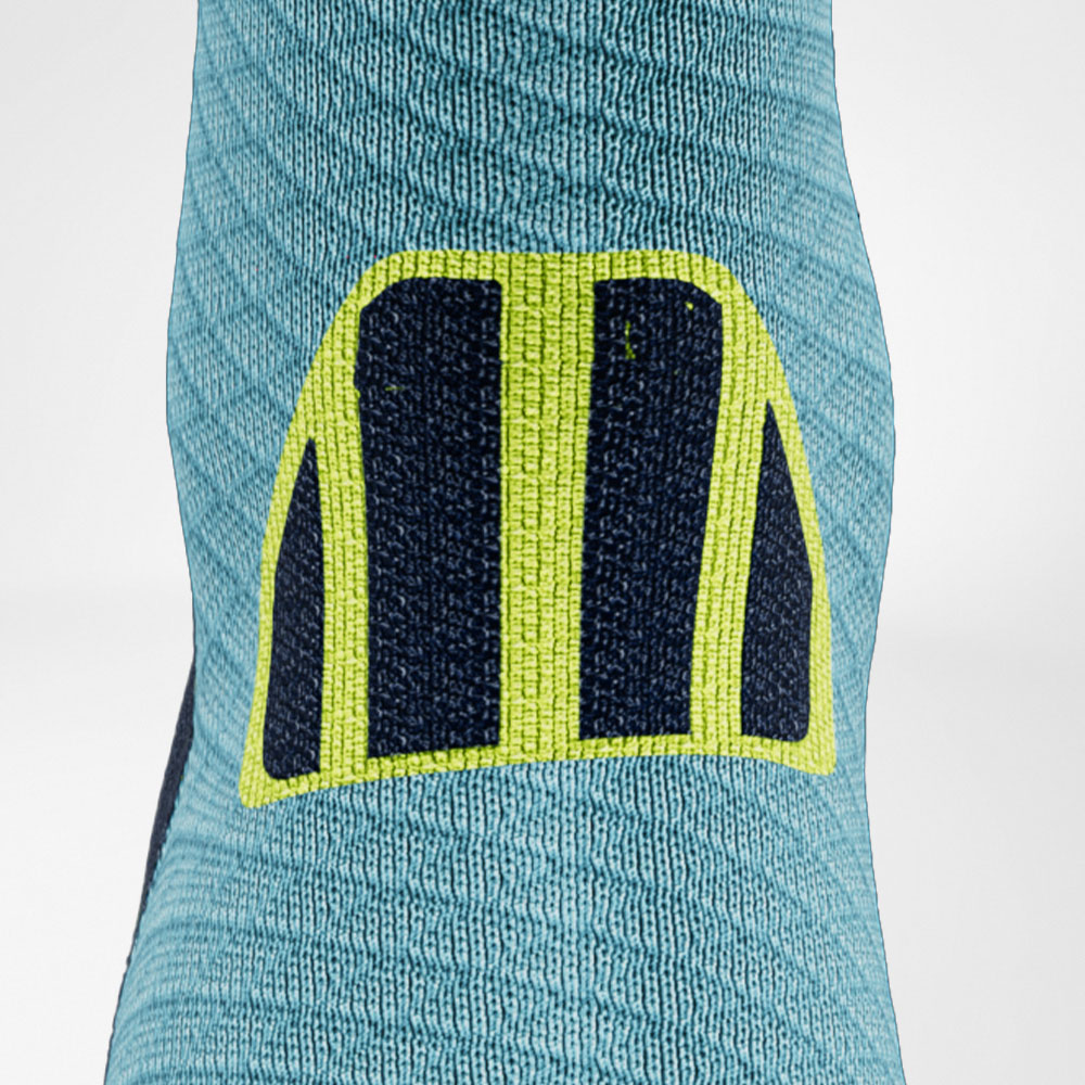 Trailrun running socks Blue-yellow Detail Achilles Comfort Detailed view of the Achilles marriage area of the blue and yellow trail run - running socks