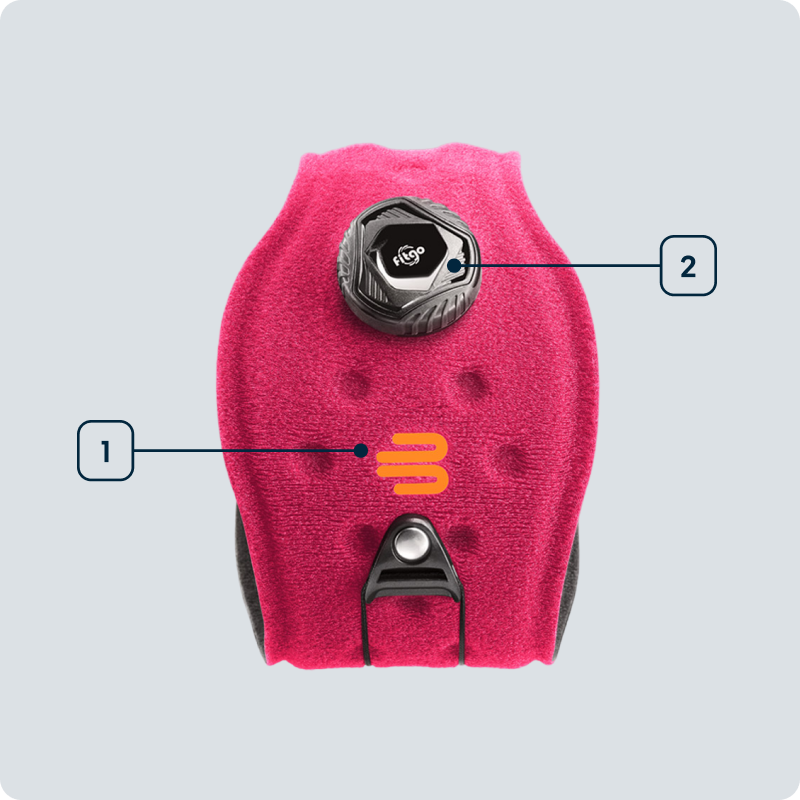 Side view of a red elbow strap showing the individual technologies used