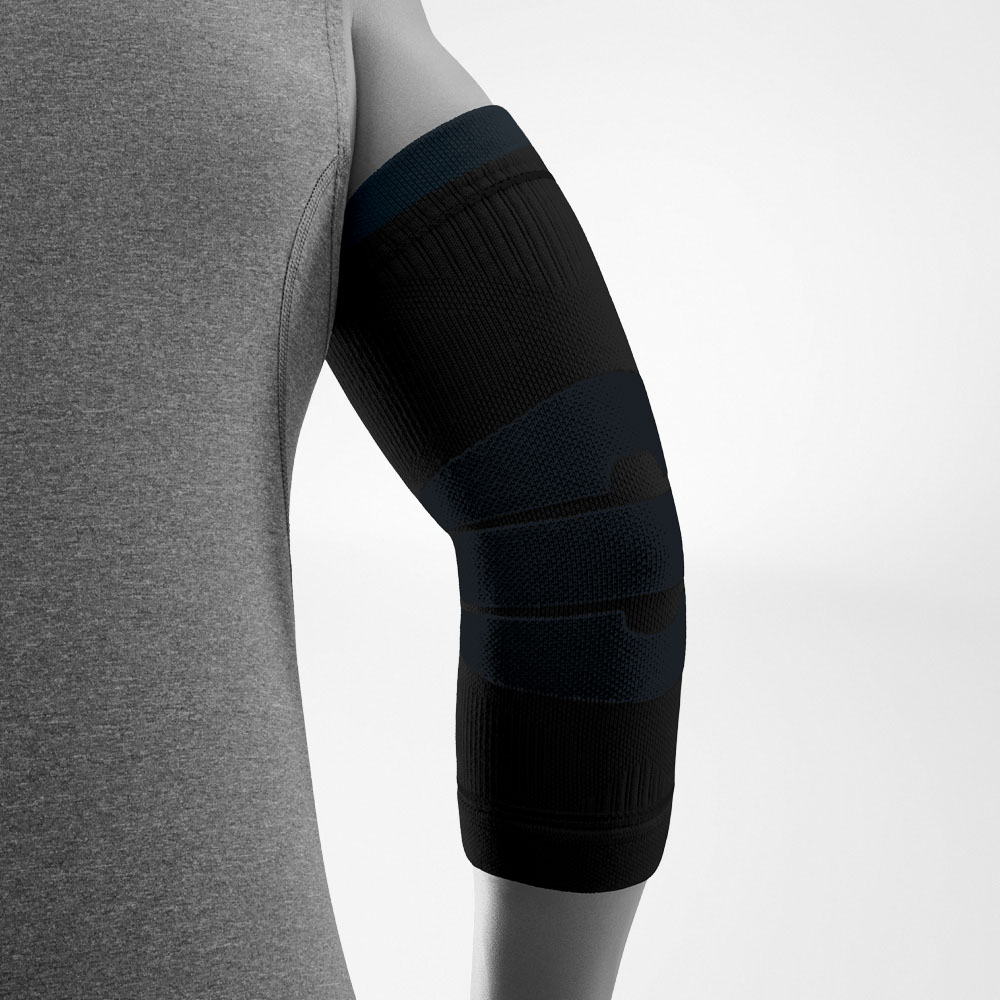 Side view of the black Outdoor Compression Elbow Support worn on an arm. The compression sleeve covers the elbow and forearm and features different knitted zones designed to support stability while allowing natural movement.