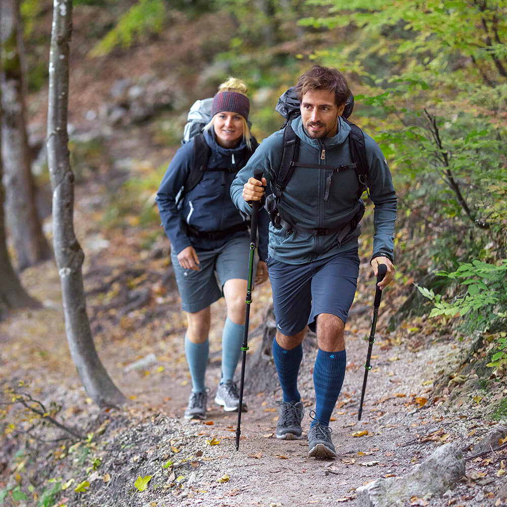 Hikers in the woods wearing Outdoor Merino Compression Socks